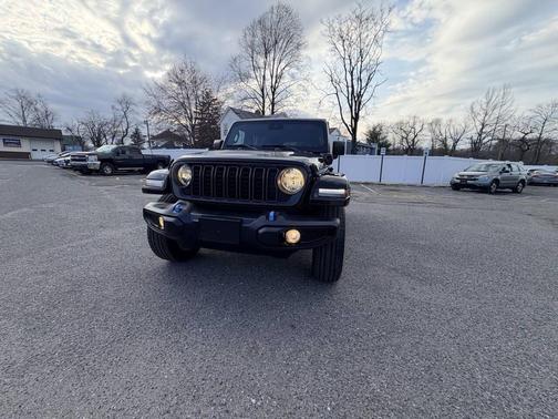 Black 2024 Jeep Wrangler 4xe Sport S