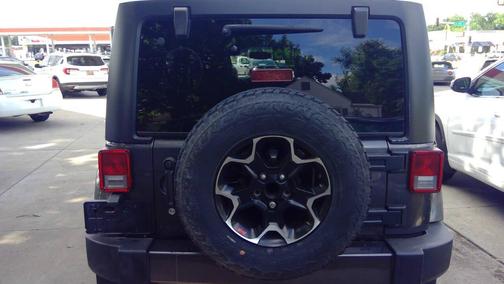Black 2016 Jeep Wrangler Unlimited Sahara