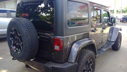 Black 2016 Jeep Wrangler Unlimited Sahara