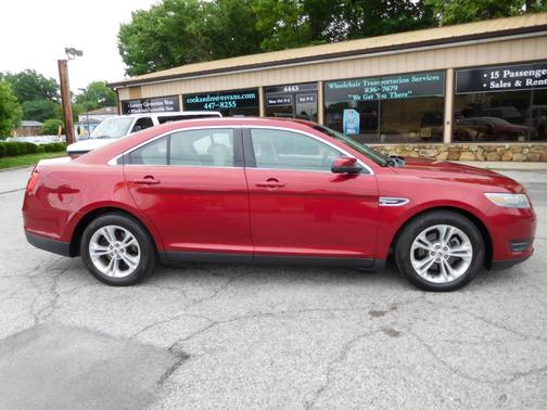 Red 2014 Ford Taurus SEL