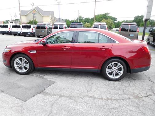 Red 2014 Ford Taurus SEL