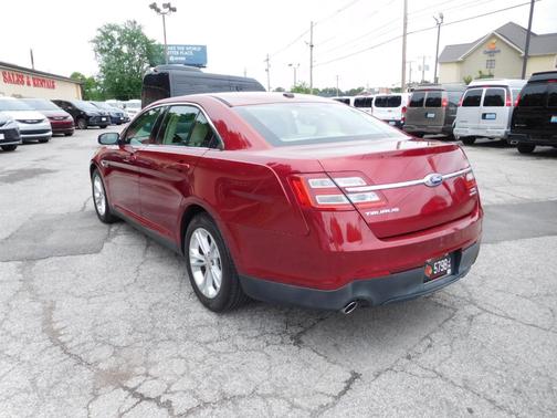 Red 2014 Ford Taurus SEL