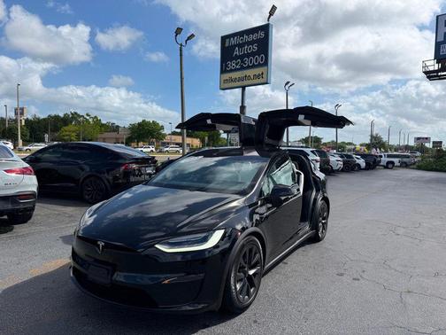 Solid Black 2023 Tesla Model X **MODEL X AWD 7 PASSENGERS**