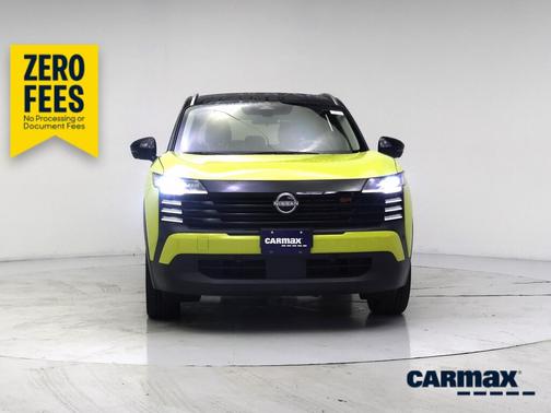 Yellow 2025 Nissan Kicks SR