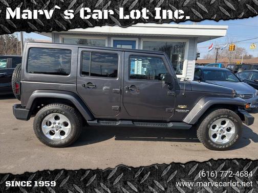 Gray 2014 Jeep Wrangler Unlimited Sahara
