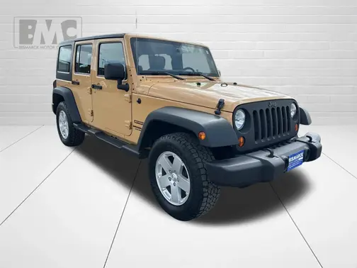 Tan 2013 Jeep Wrangler Unlimited Sport