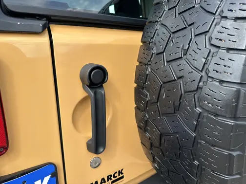 Tan 2013 Jeep Wrangler Unlimited Sport