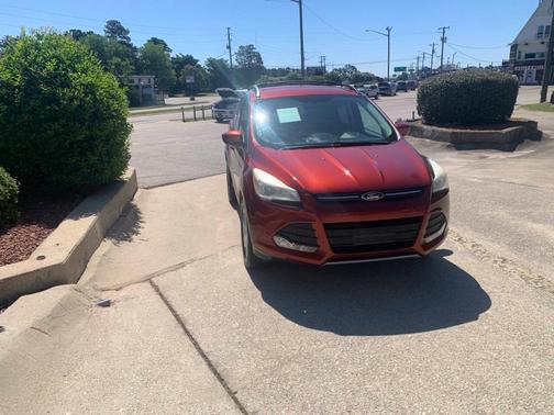 Orange 2015 Ford Escape SE