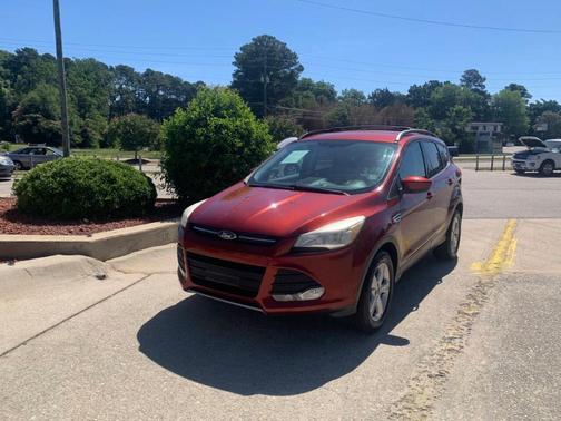 Orange 2015 Ford Escape SE