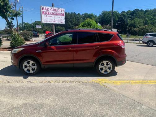 Orange 2015 Ford Escape SE