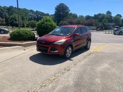 Orange 2015 Ford Escape SE