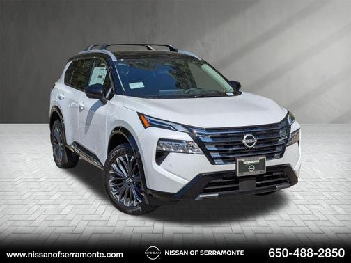 Everest White Pearl/Super Black 2026 Nissan Rogue Platinum