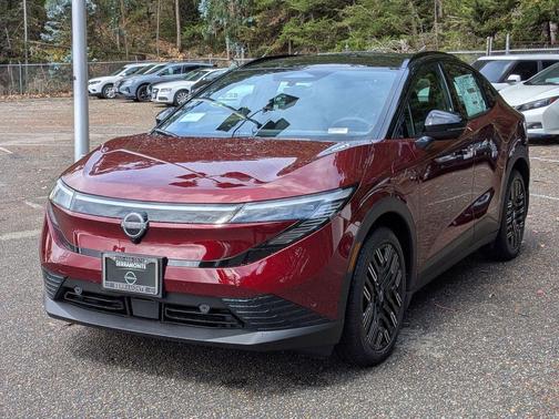Coulis Red Metallic/Black 2026 Nissan Leaf PLATINUM+