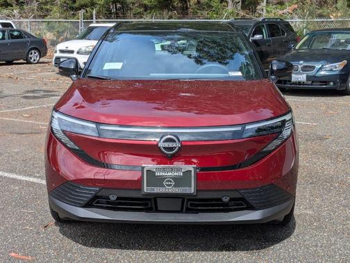 Coulis Red Metallic/Black 2026 Nissan Leaf PLATINUM+