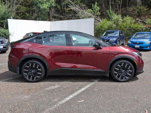 Coulis Red Metallic/Black 2026 Nissan Leaf PLATINUM+