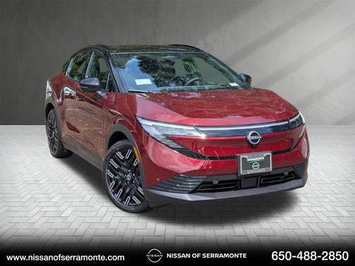Coulis Red Metallic/Black 2026 Nissan Leaf PLATINUM+