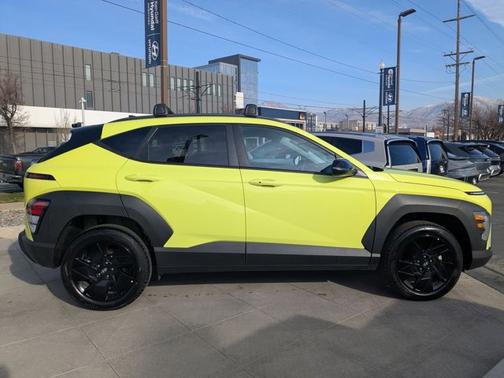 Yellow 2026 Hyundai KONA SEL Sport