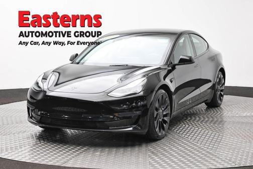 Solid Black 2023 Tesla Model 3 Performance