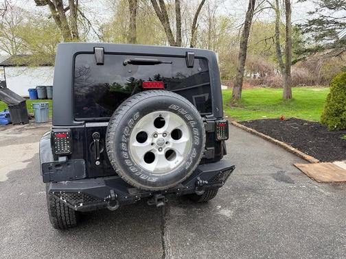 Black Clearcoat 2014 Jeep Wrangler Unlimited Sahara