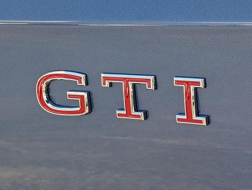 slate blue metallic 2026 Volkswagen Golf GTI 2.0T SE DSG