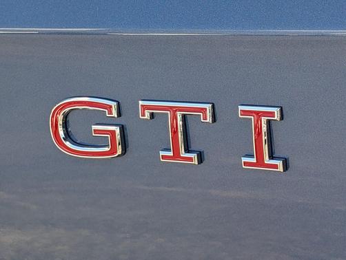slate blue metallic 2026 Volkswagen Golf GTI 2.0T SE DSG