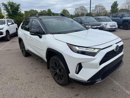 Wind Chill Pearl/Midnight Black Metallic 2023 Toyota RAV4 Hybrid SE