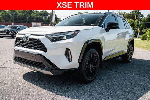 Midnight Black Metallic 2024 Toyota RAV4 Hybrid SE