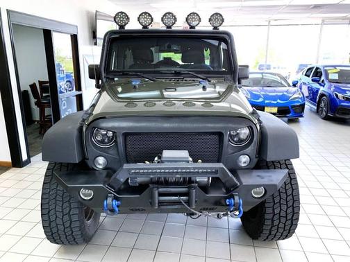 Black 2015 Jeep Wrangler Unlimited Sport