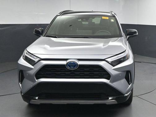 Silver Sky Metallic/Midnight Black Metallic 2024 Toyota RAV4 Hybrid SE