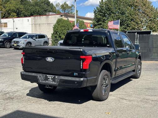 Agate Black Metallic 2024 Ford F-150 Lightning Flash