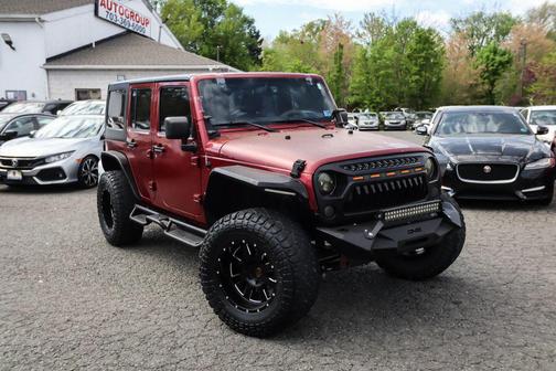 Burgundy 2013 Jeep Wrangler Unlimited Sport