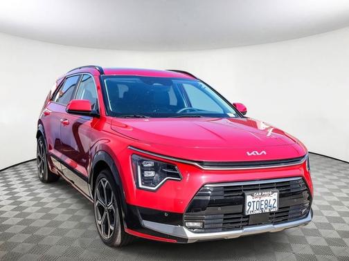 Red 2025 Kia Niro SX Touring