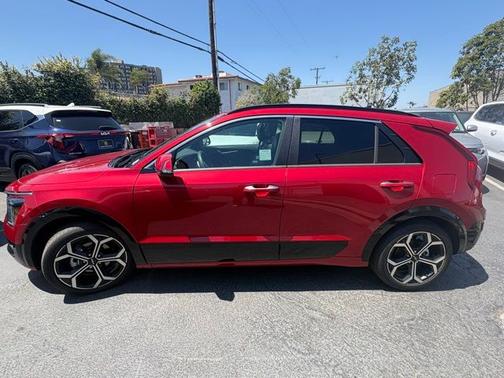 Runway Red 2025 Kia Niro SX Touring