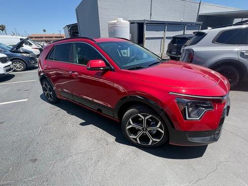 Runway Red 2025 Kia Niro SX Touring