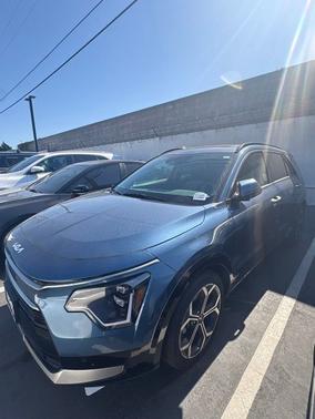 Mineral Blue 2025 Kia Niro SX Touring