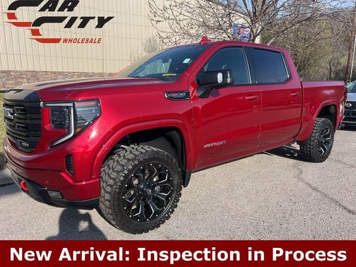 Volcanic Red Tintcoat 2023 GMC Sierra 1500 AT4X