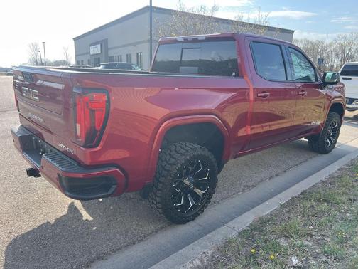 Volcanic Red Tintcoat 2023 GMC Sierra 1500 AT4X