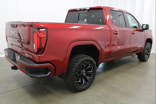 Volcanic Red Tintcoat 2023 GMC Sierra 1500 AT4X