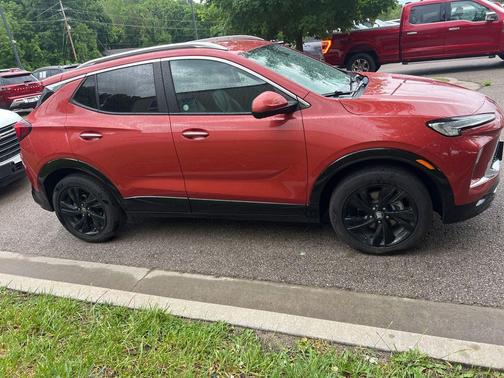 Sunrise Red Metallic 2024 Buick Encore GX Sport Touring