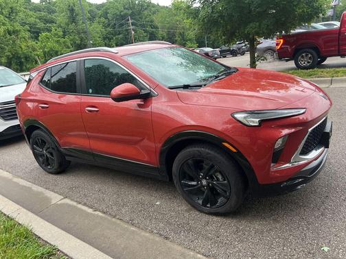 Sunrise Red Metallic 2024 Buick Encore GX Sport Touring