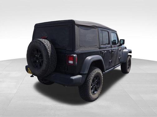 Black 2023 Jeep Wrangler Sport