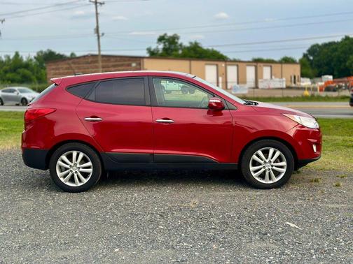 Red 2011 Hyundai TUCSON Limited