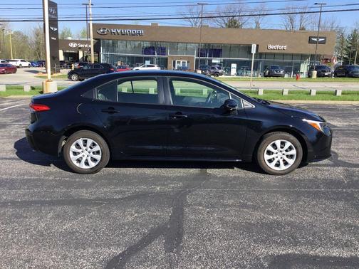 Midnight Black Metallic 2024 Toyota Corolla Hybrid LE