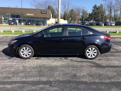 Midnight Black Metallic 2024 Toyota Corolla Hybrid LE
