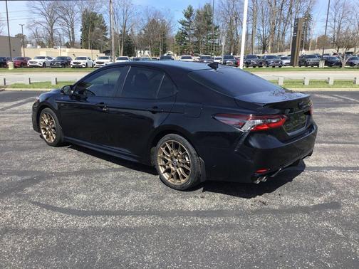 Midnight Black Metallic 2024 Toyota Camry Hybrid SE