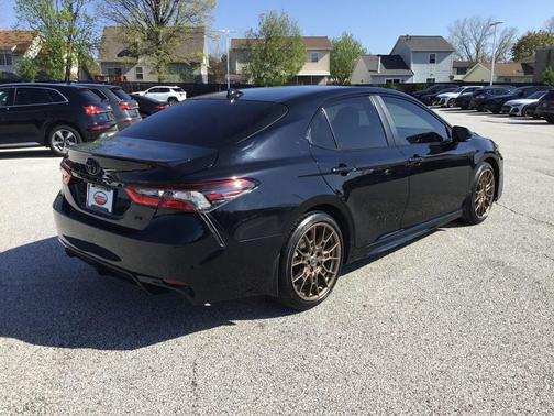 Midnight Black Metallic 2024 Toyota Camry Hybrid SE