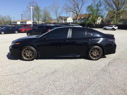 Midnight Black Metallic 2024 Toyota Camry Hybrid SE