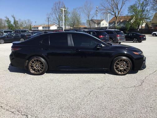 Midnight Black Metallic 2024 Toyota Camry Hybrid SE