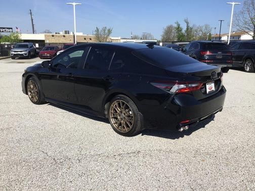 Midnight Black Metallic 2024 Toyota Camry Hybrid SE