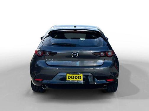 Machine Gray Metallic 2026 Mazda Mazda3 AWD w/Premium Package